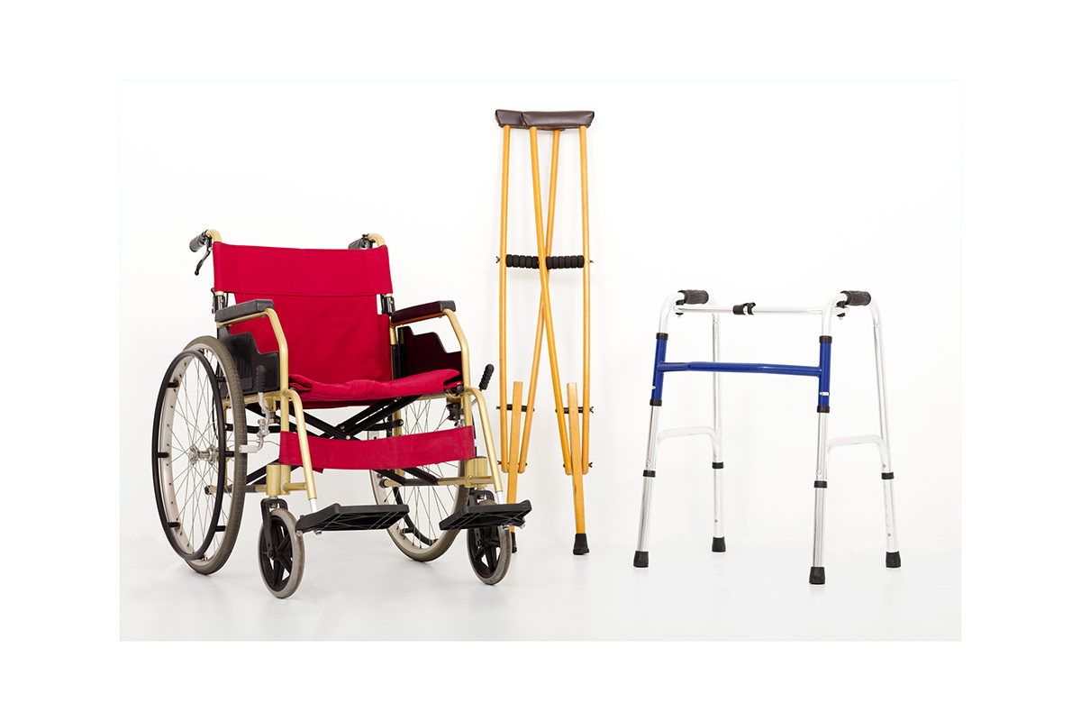 A wheelchair, crutches and walker