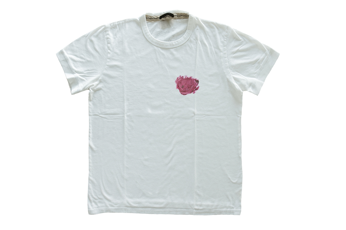 A white t-shirt with a stain