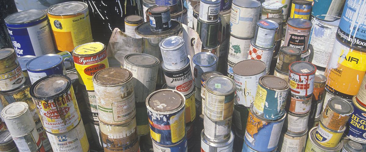 Old paint cans ready for disposal