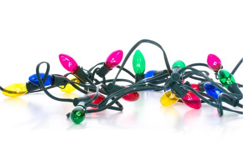 A pile of holiday lights with large bulbs