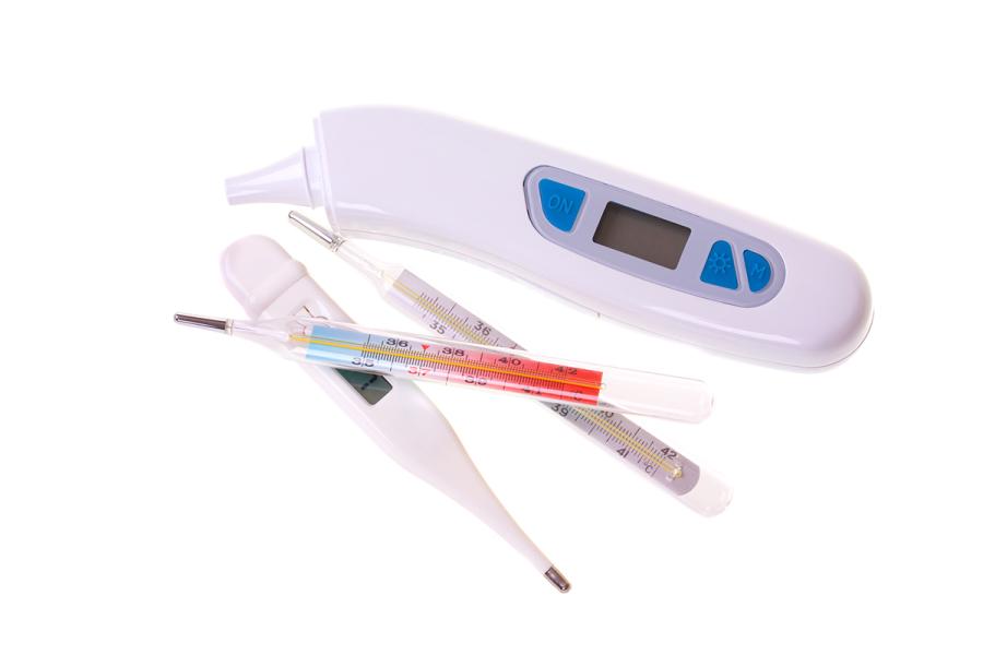 Different styles of digital and mercury thermometers